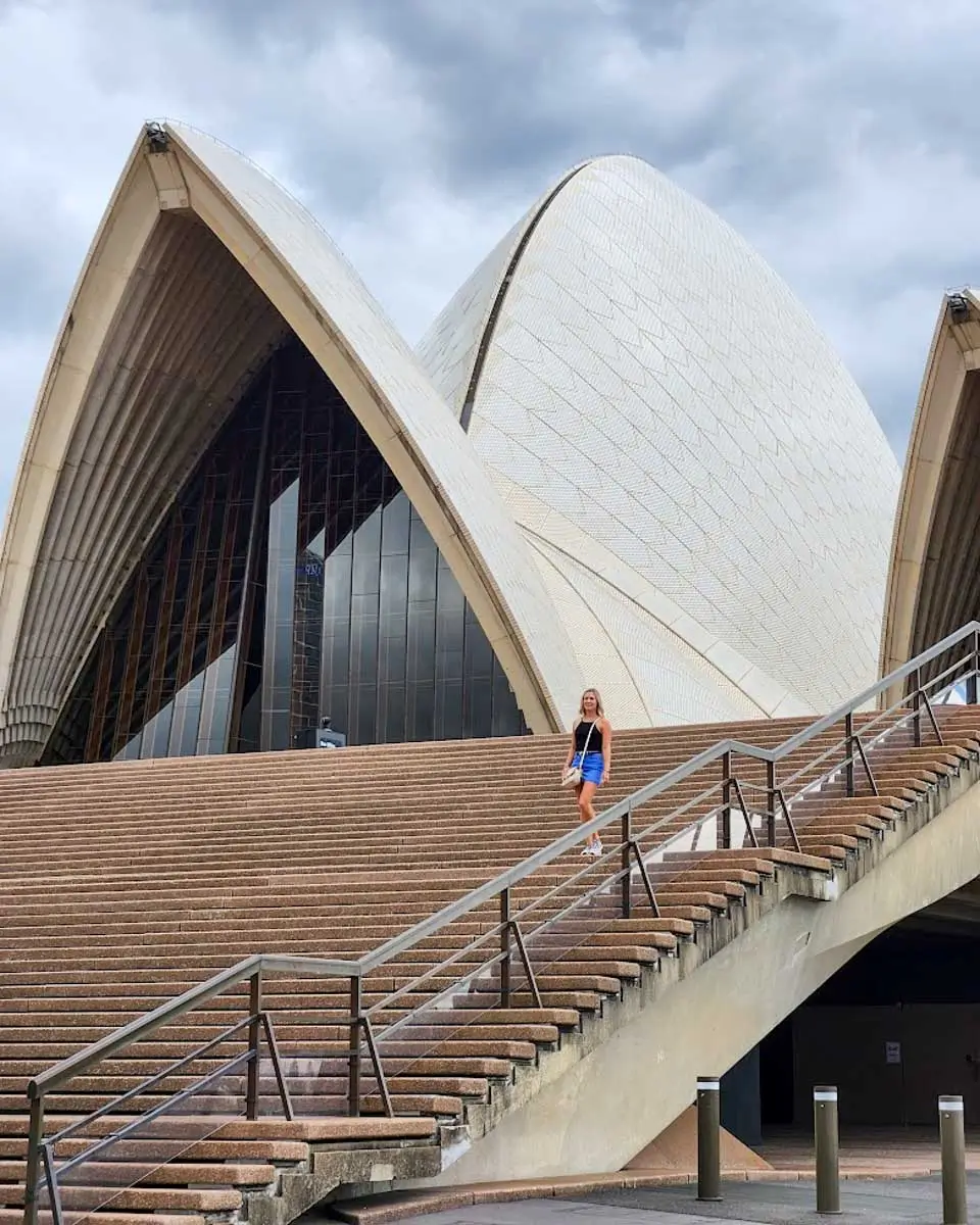 Bailey standing on the stairs of Sydney Opera House, Australia