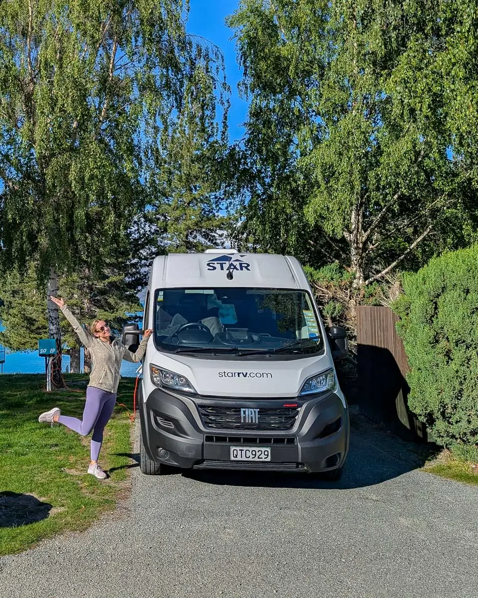 Bailey stands with a Star RV campervan in Australia
