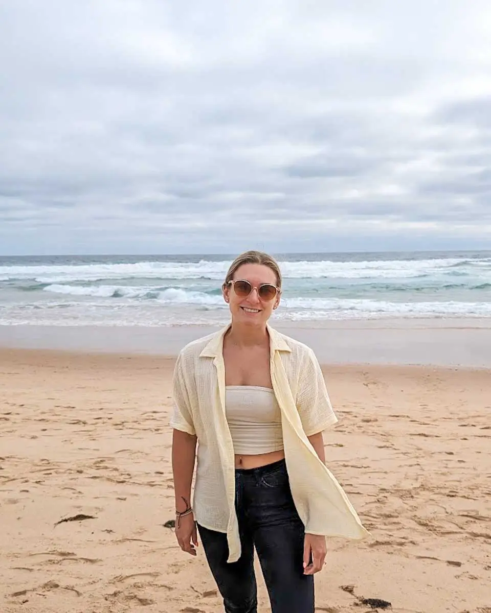 Bailey taking a photo in Mission Beach, Australia