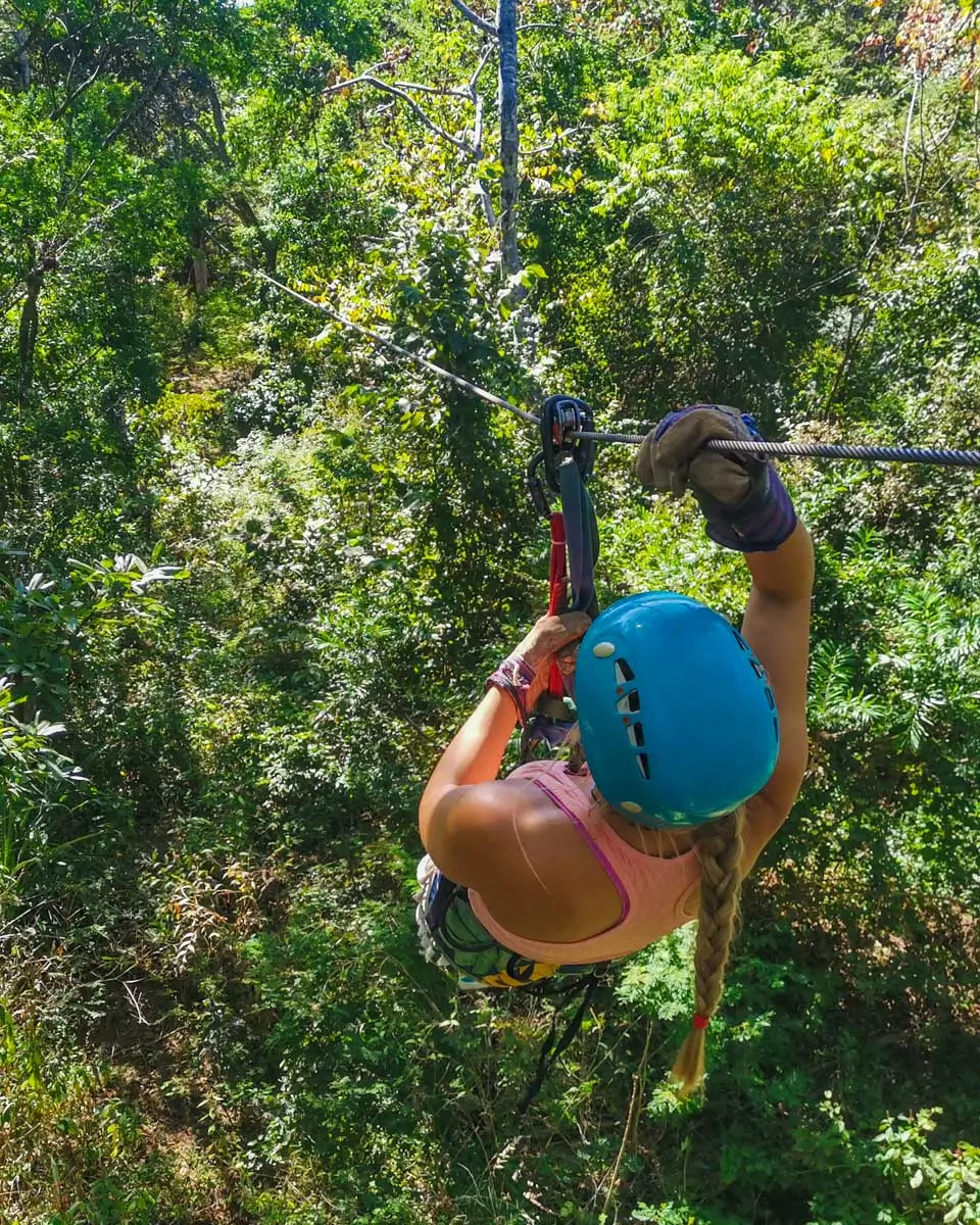 Bailey ziplining in Roatan’s jungle in Honduras