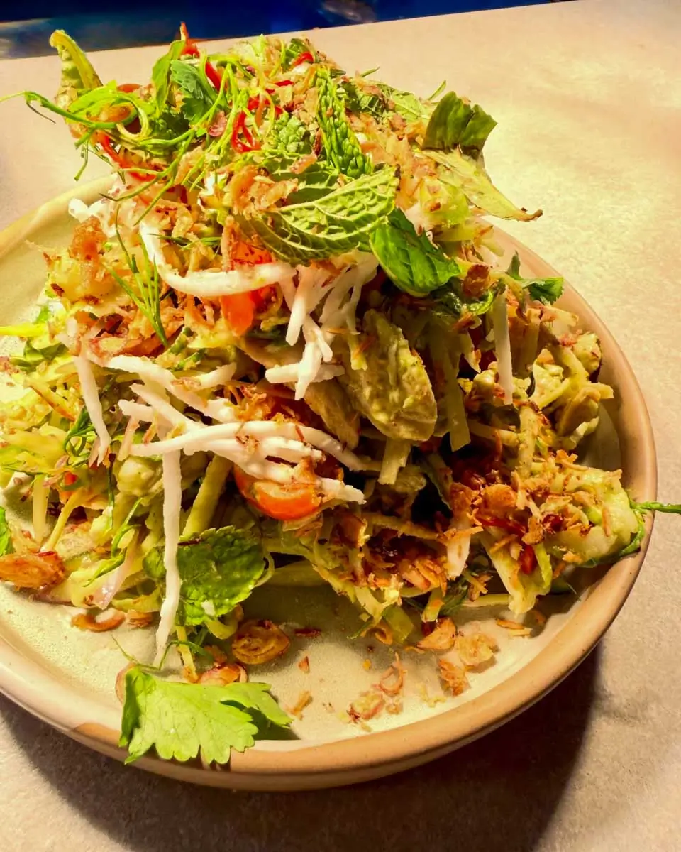 Coconut chicken salad eaten at Eastwoods Dining, Australia