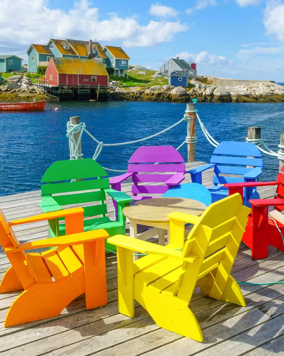 Colorful chairs seen at Peggy's Cove on a tour from Halifax, Nova Scotia