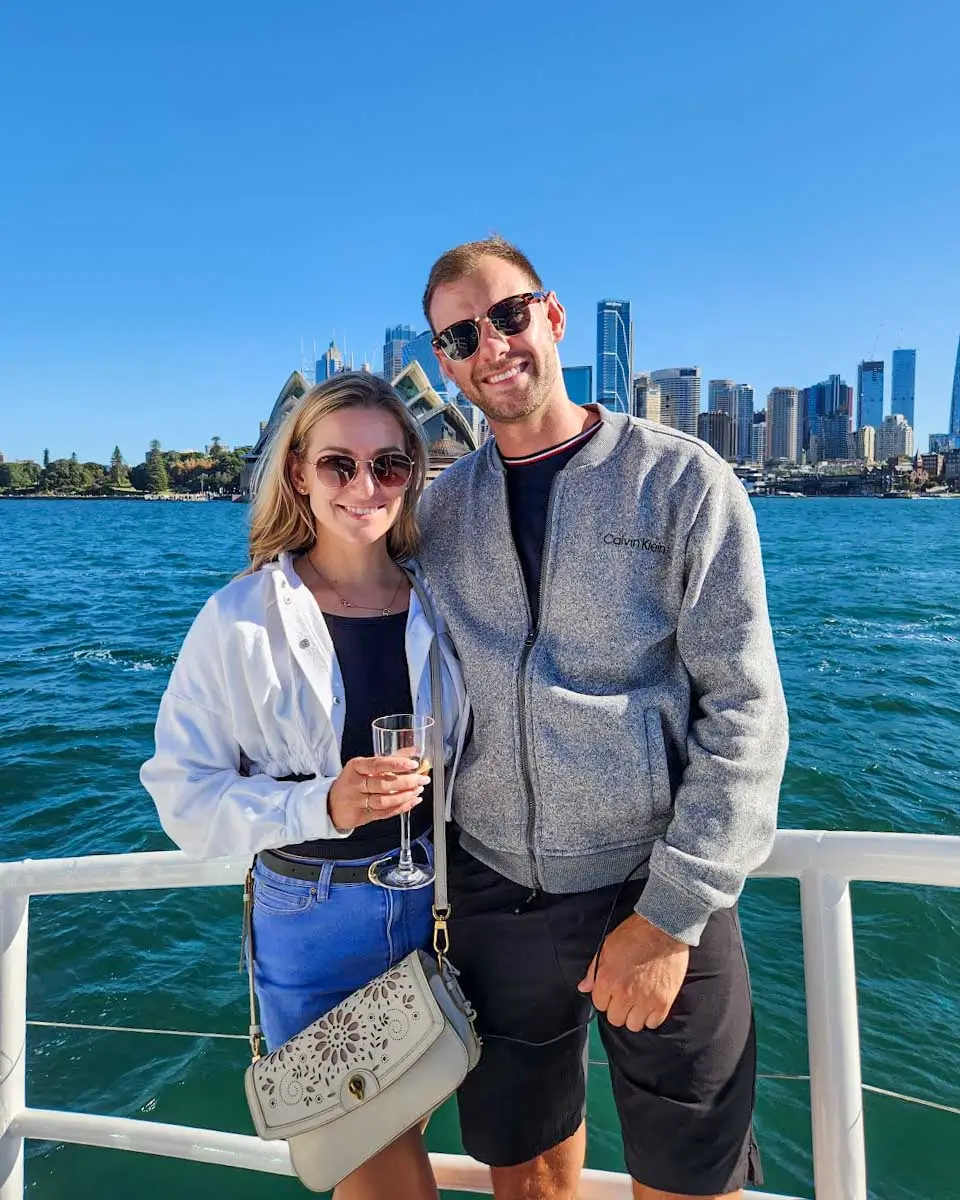 Daniel and Bailey taking a photo on a Sydney Harbour Cruise