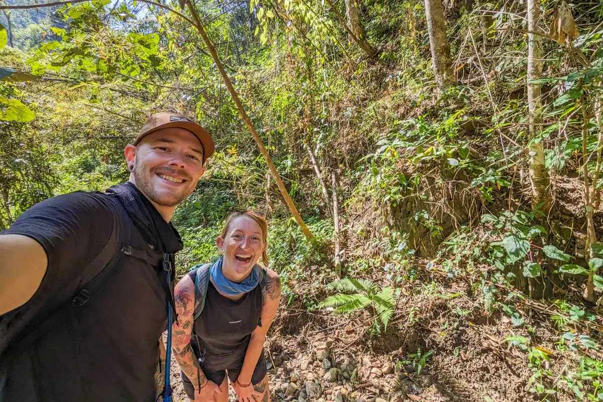 Evan and Meghan hike in the jungle of Pai, Thailand