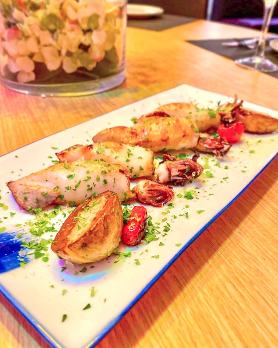 Grilled baby squid eaten at Restaurante Divinno in Malaga