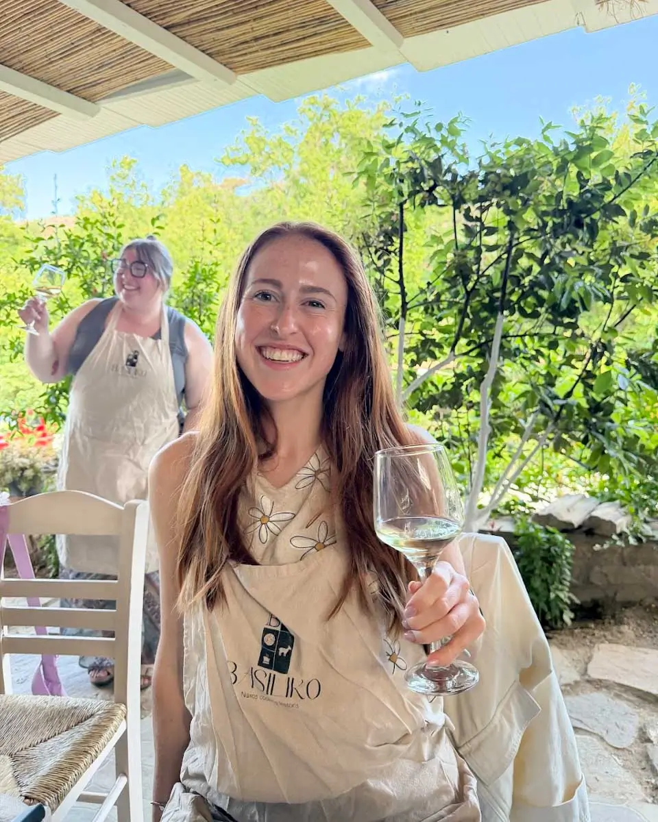 Hannah drinking wine at a cooking class in Naxos, Greece