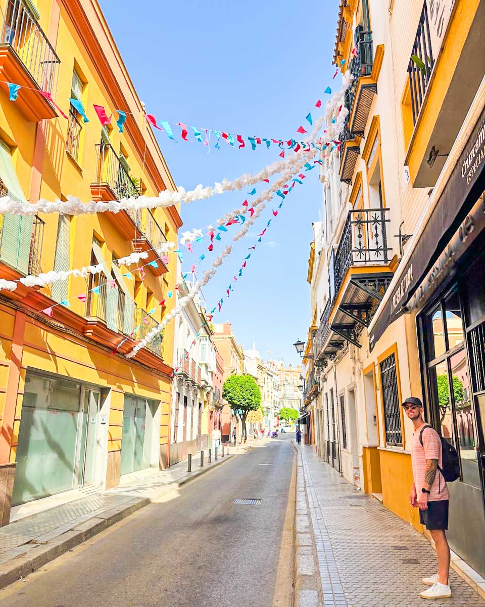 Jesse walks through the colorful Triana neighborhood in Seville