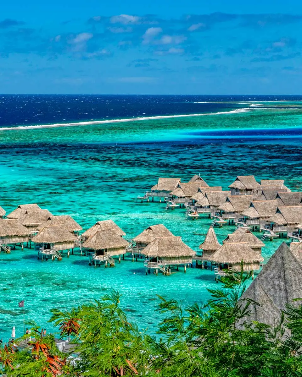 Overwater Bungalwos on Moorea lagoon view from To'atea lookout in French Polynesia