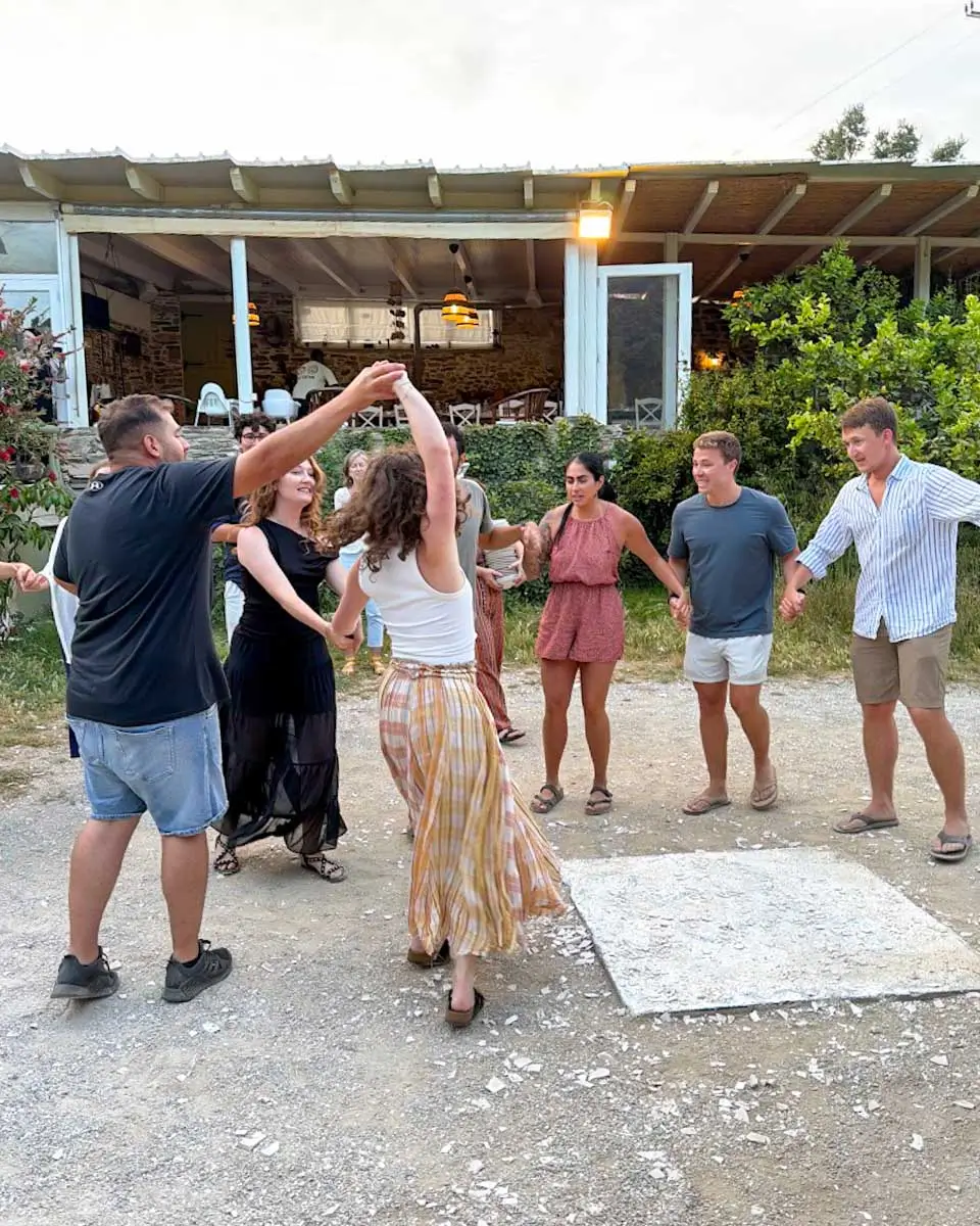 People dancing during the cooking class in Naxos, Greece