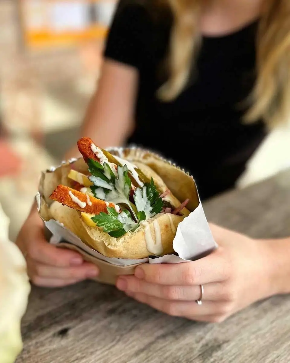 Schnitzel Pita Pocket at Little Byronian, Australia