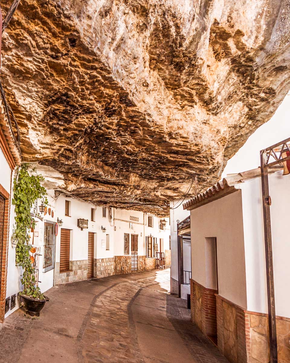 Streets and houses under the mountain rocks in Setenil, Spain