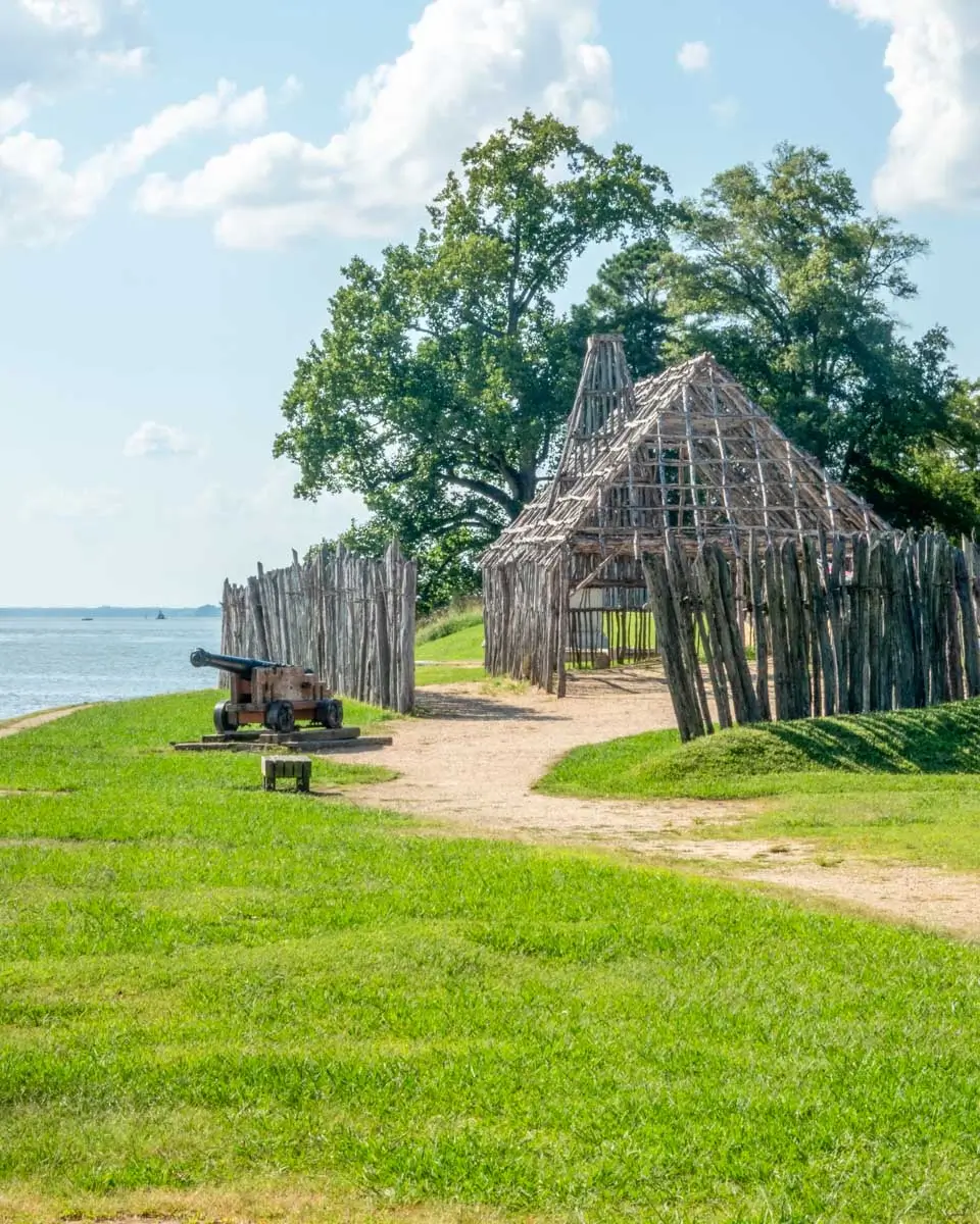 Wooden fort and building in Historic Jamestown Settlement on a tour from Williamsburg, Virginia