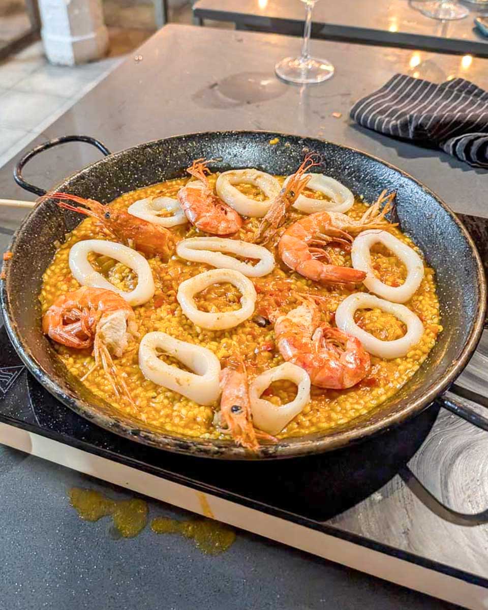 A-pan-with-shrimp-paella-during-a-Paella-making-class-in-Malaga-Spain