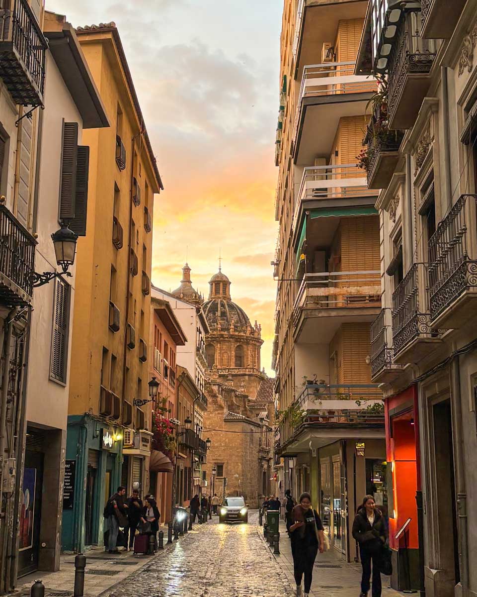 A street in Granada, Spain at sunset