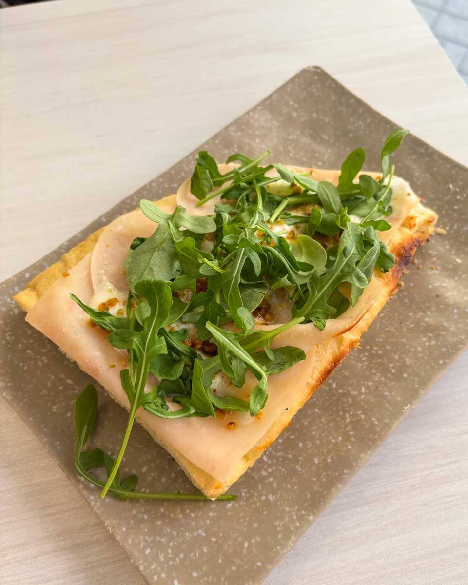 An open-faced sandwich eaten at Artesanos de Granada