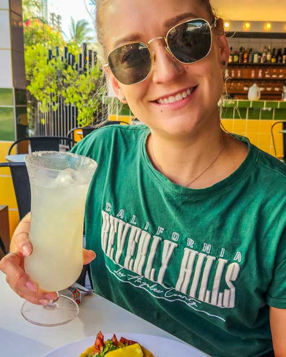 Bailey drinking margarita on a food tour in Albuquerque, New Mexico