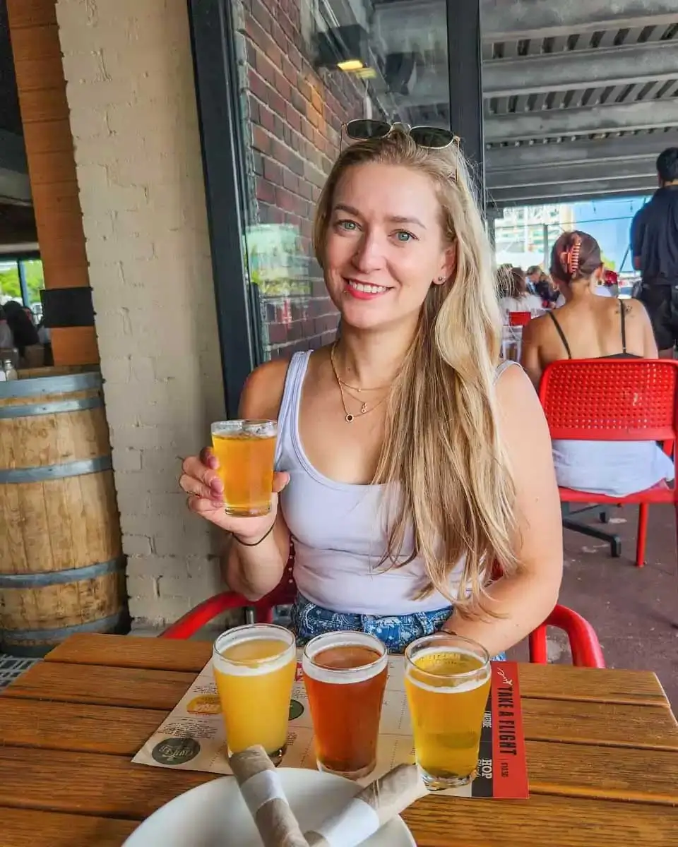 Bailey drinks beer in Virginia Beach
