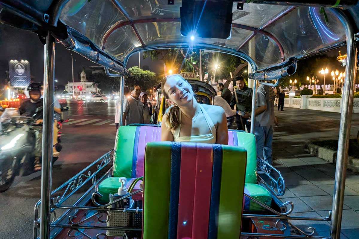Bailey smiles in a tuk tuk in Laos