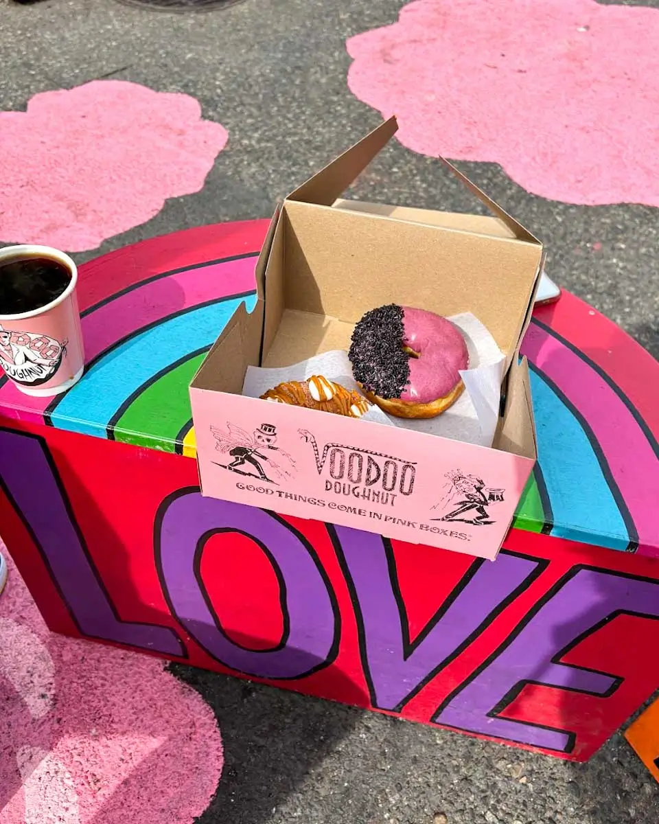 Box of donuts with coffee from Voodoo Donuts, Portland, Oregon