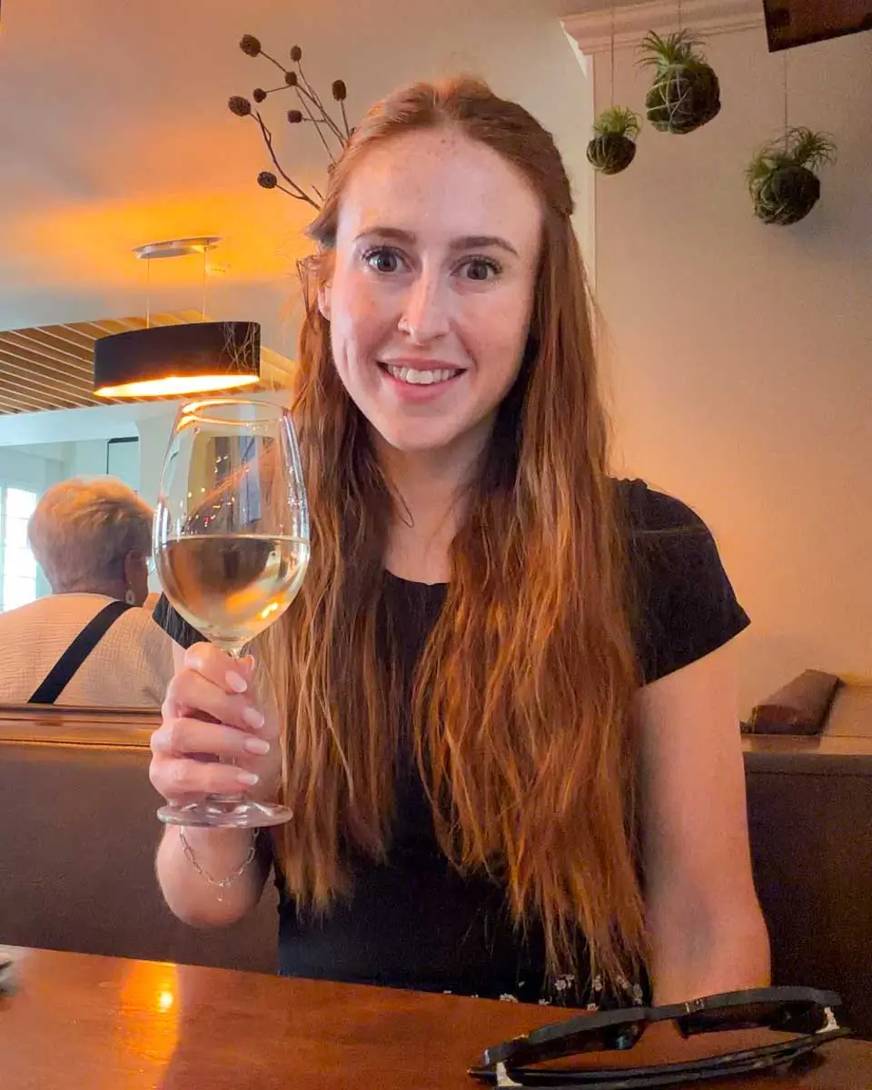 Hannah having wine at Kampo, Madeira, Portugal
