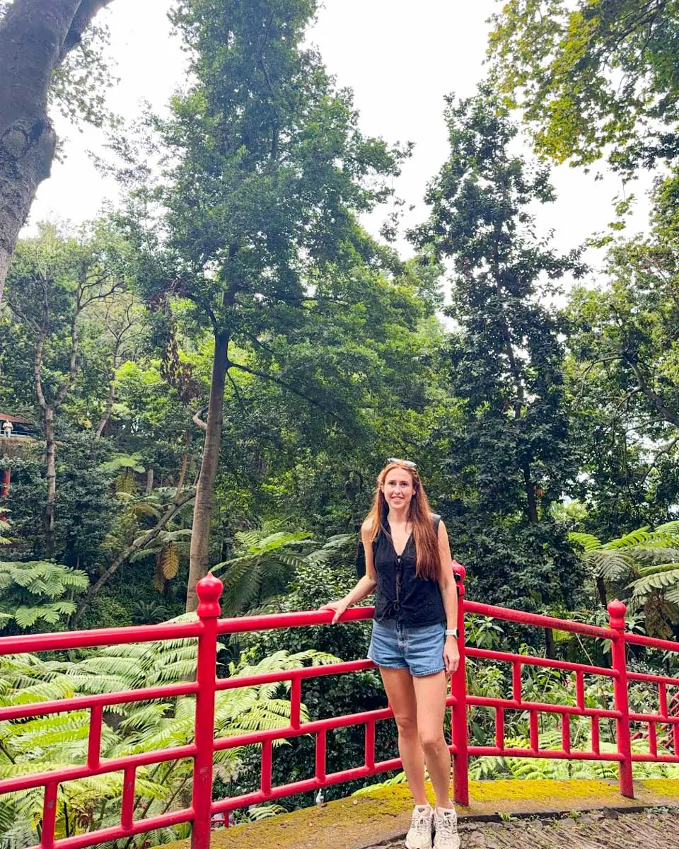 Hannah posing at a bridge in Monte Palace Tropical Garden in Madeira, Portugal