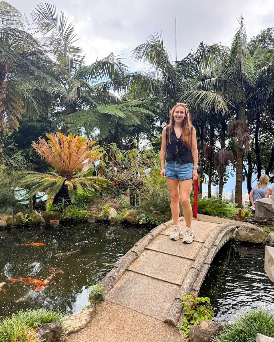 Hannah standing on a bridge in Monte Palace Tropical Garden, Madeira, Portugal