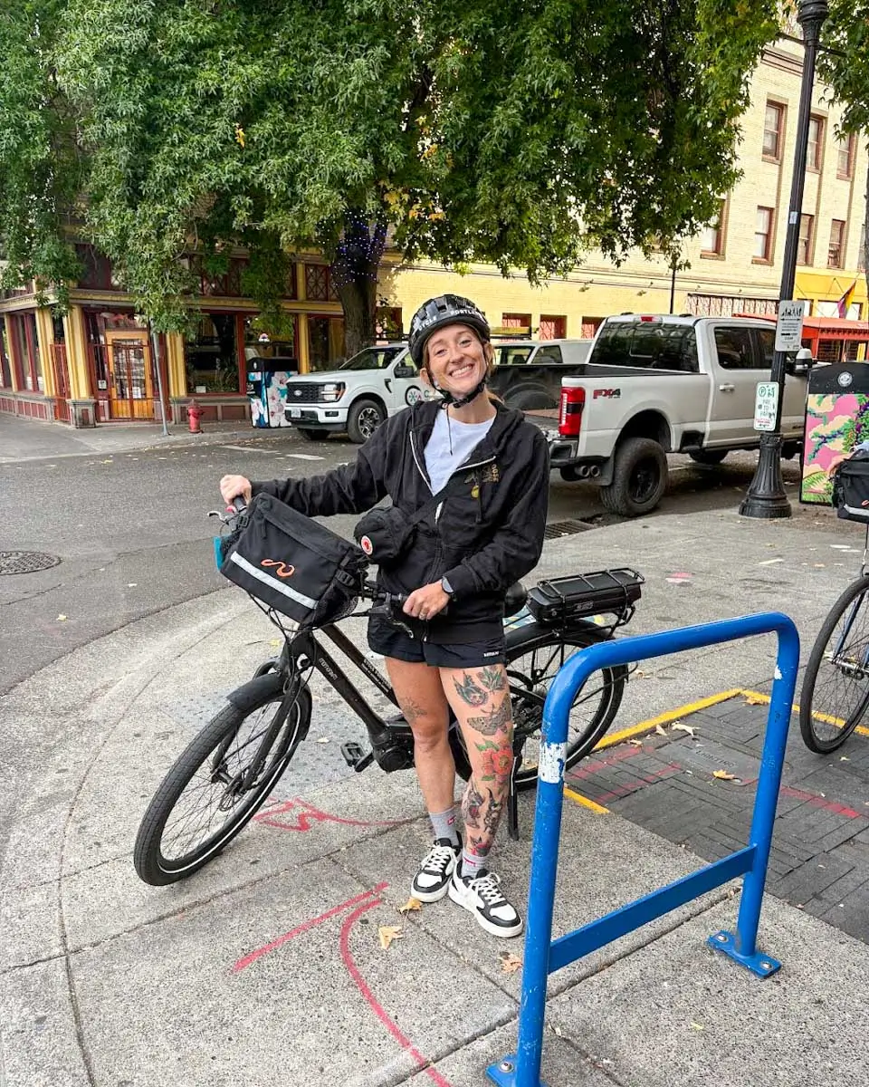 Meghan with her bike on e-bike tour in Portland, Oregon