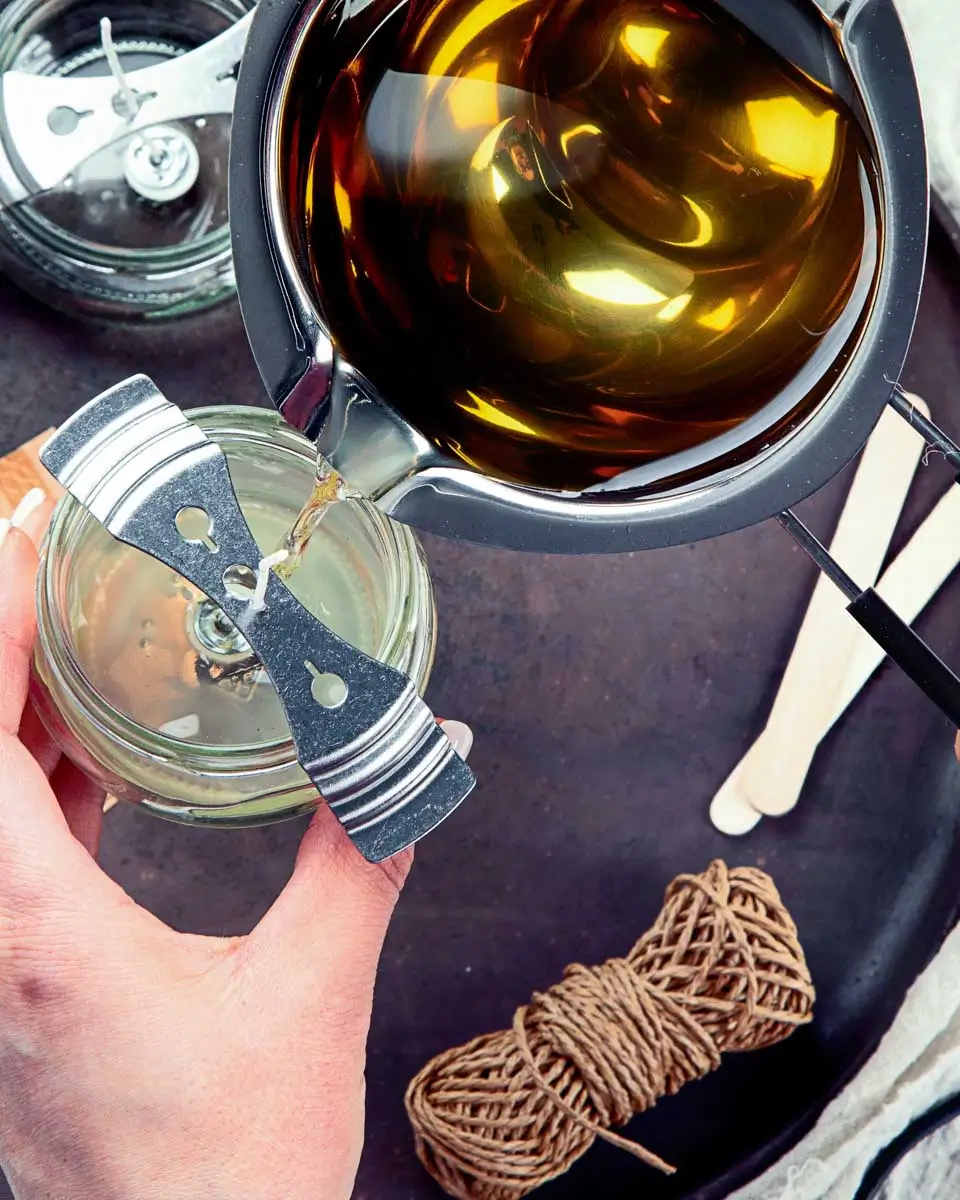 Pouring wax in a candle making class in Virginia Beach, Virginia