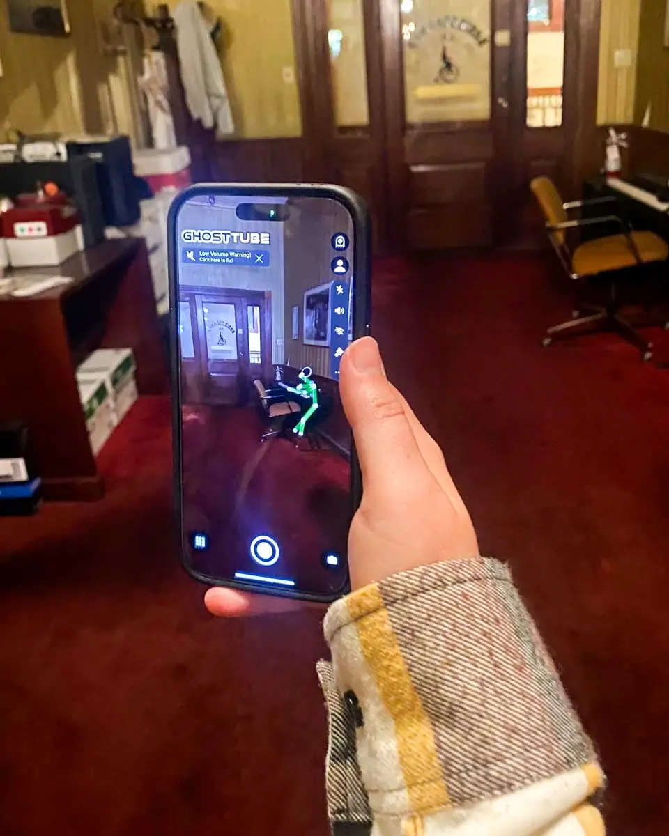 Scanning for ghosts on a hauunted tour in Pensacola, Florida