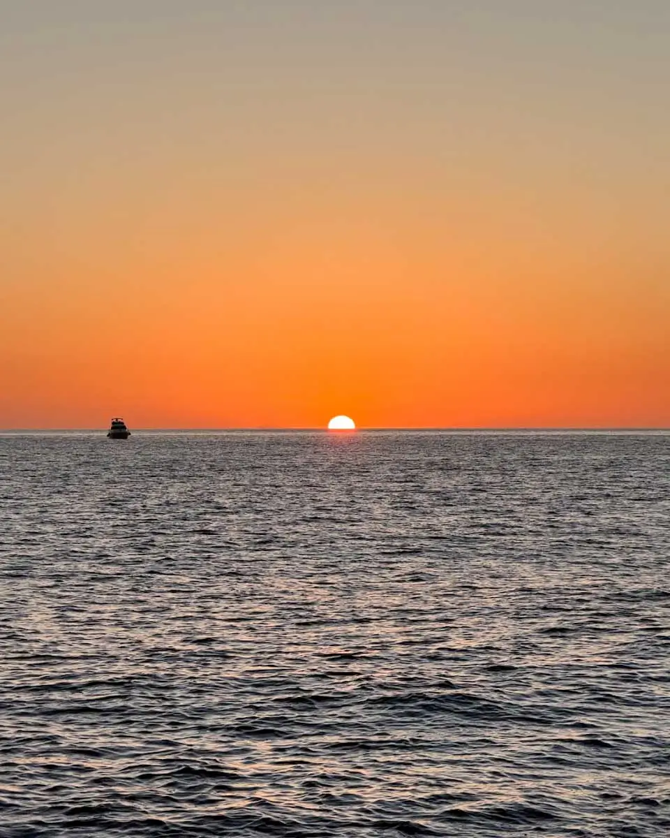 Sunset seen from catamaran cruise in Madeira, Portugal