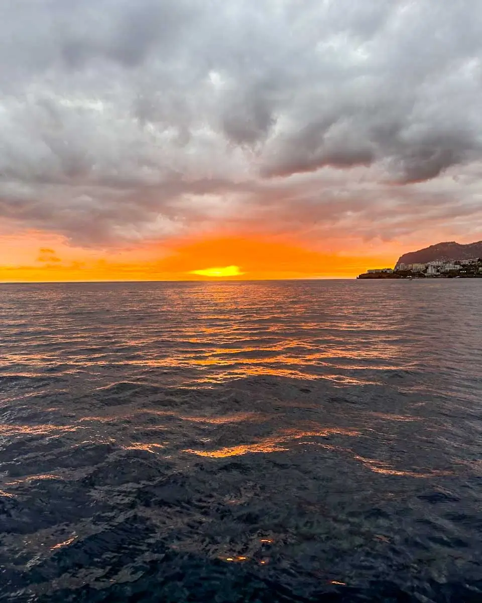 Sunset seen from catamaran cruise in Madeira, Portugal
