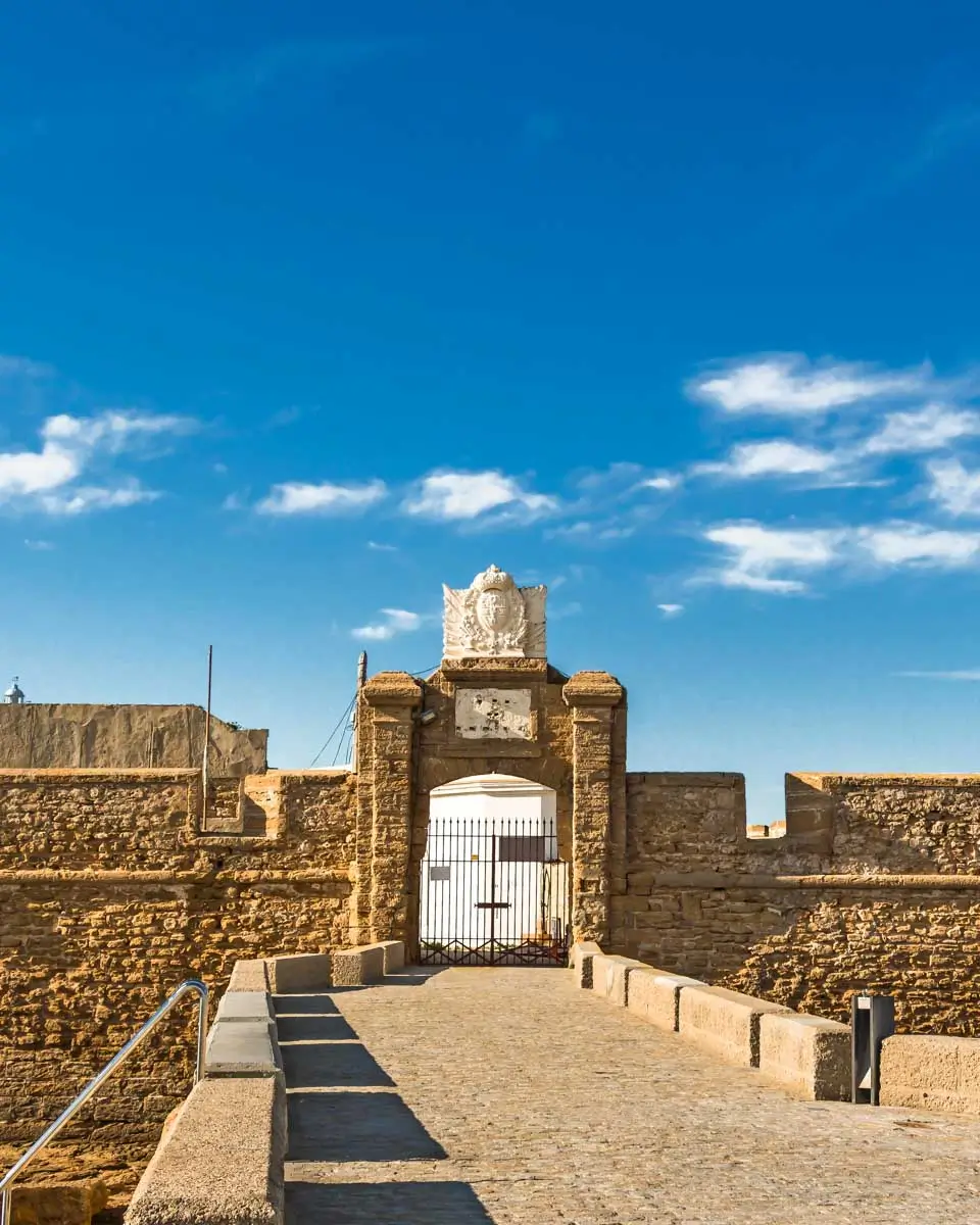 The front gate and fortress walls of Castillo de San Sebastian, Cadiz Spain