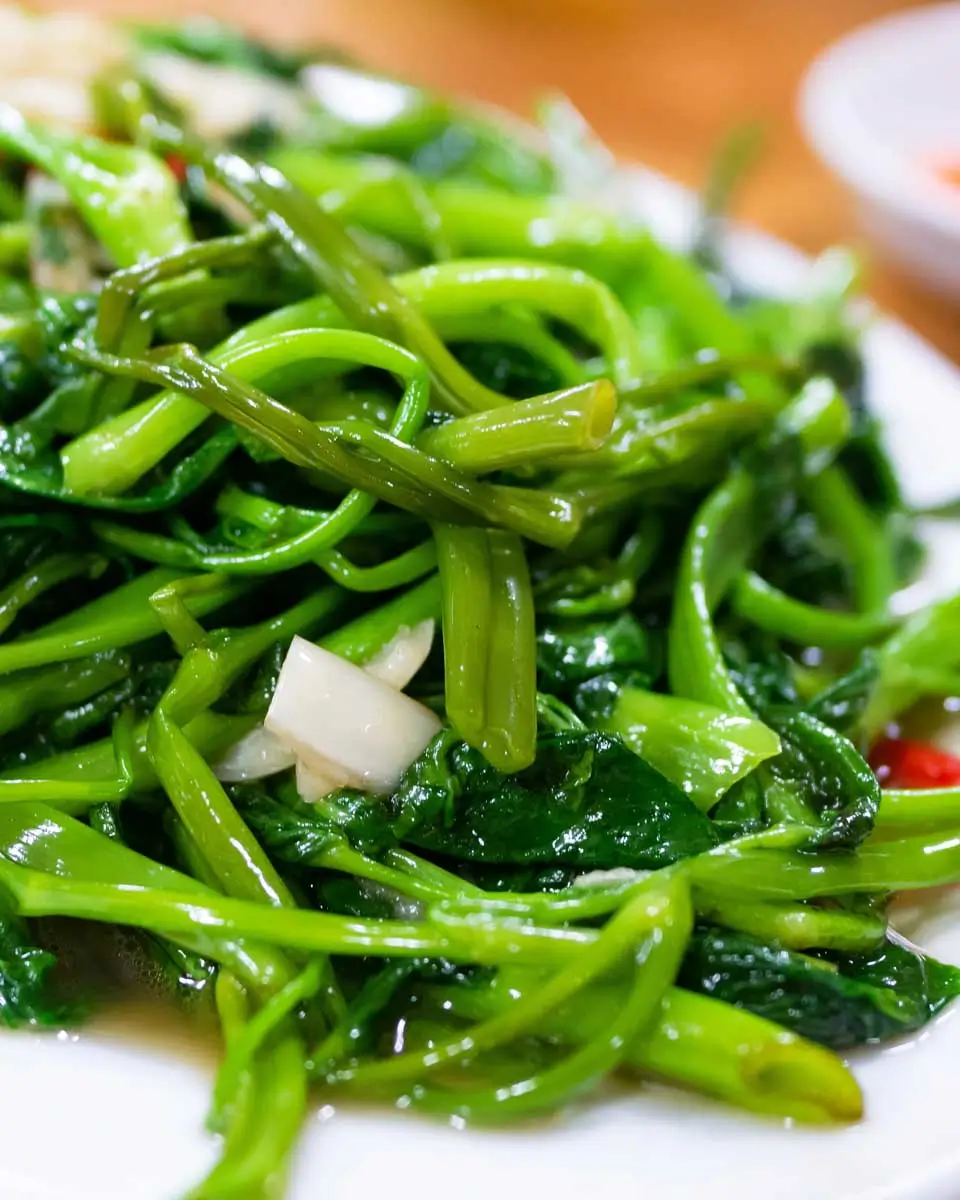 Vietnamese fried morning glory eaten on a food tour in Da Nang, Vietnam