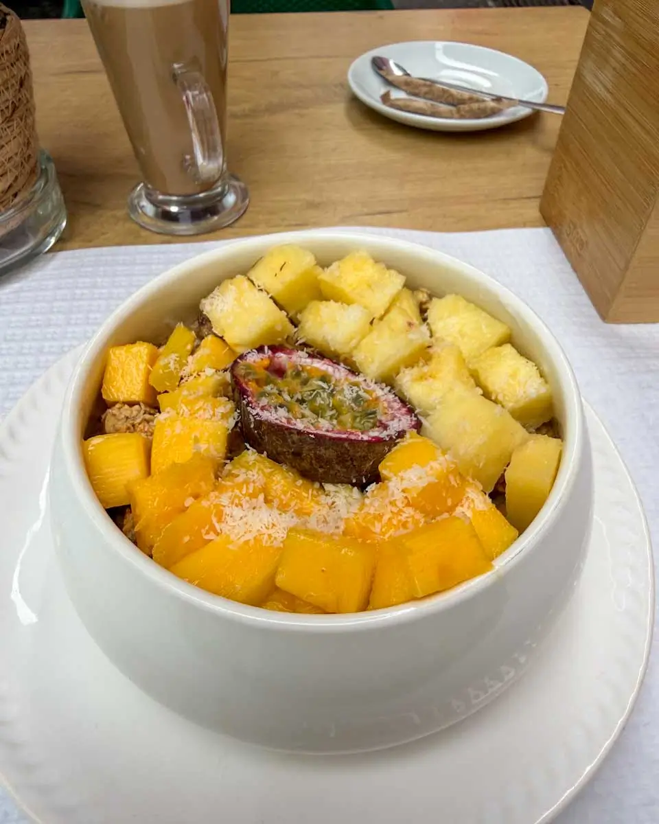 Yogurt and granola bowl eaten at Raiz Quadrada Momo, Madeira, Portugal